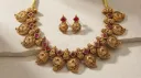 Ethnic Necklace and Earrings with Goddess Lakshmi Motifs and Ruby Red Stones